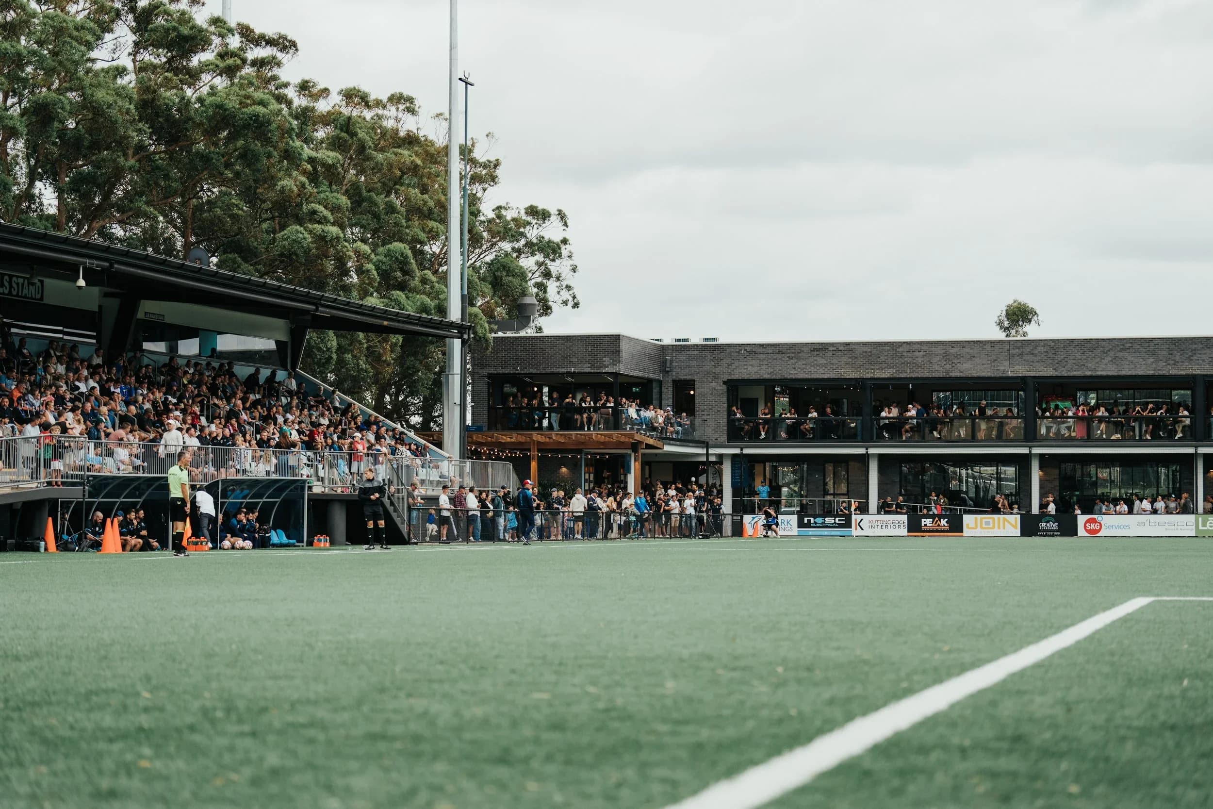 Seymour Shaw's grandstand and pitch on a cloudy day