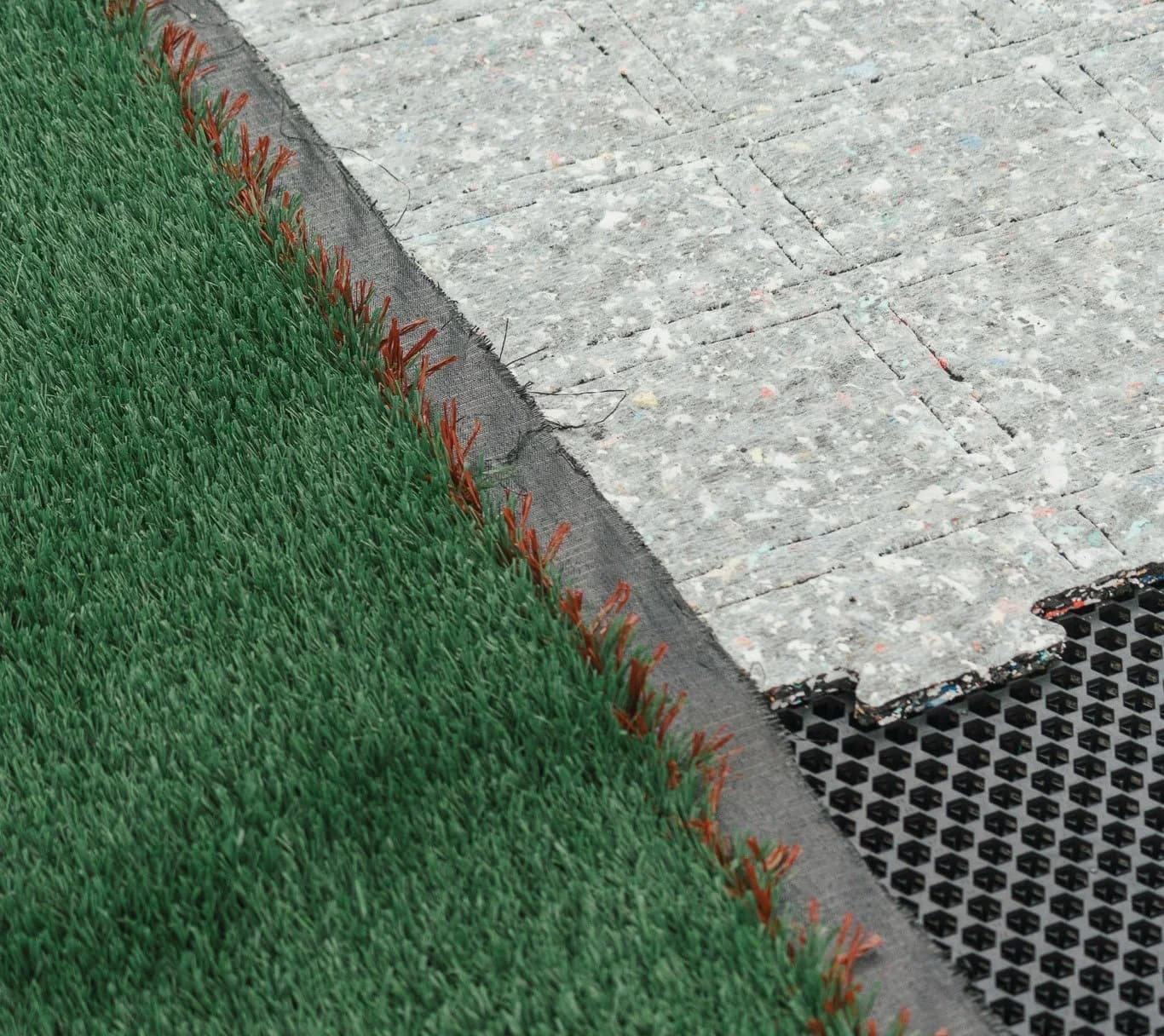A close-up of the new synthetic pitch's turf and shock pad