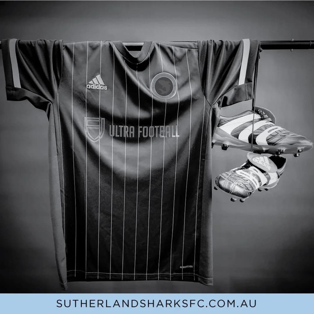 A limited-edition black Sharks shirt and boots