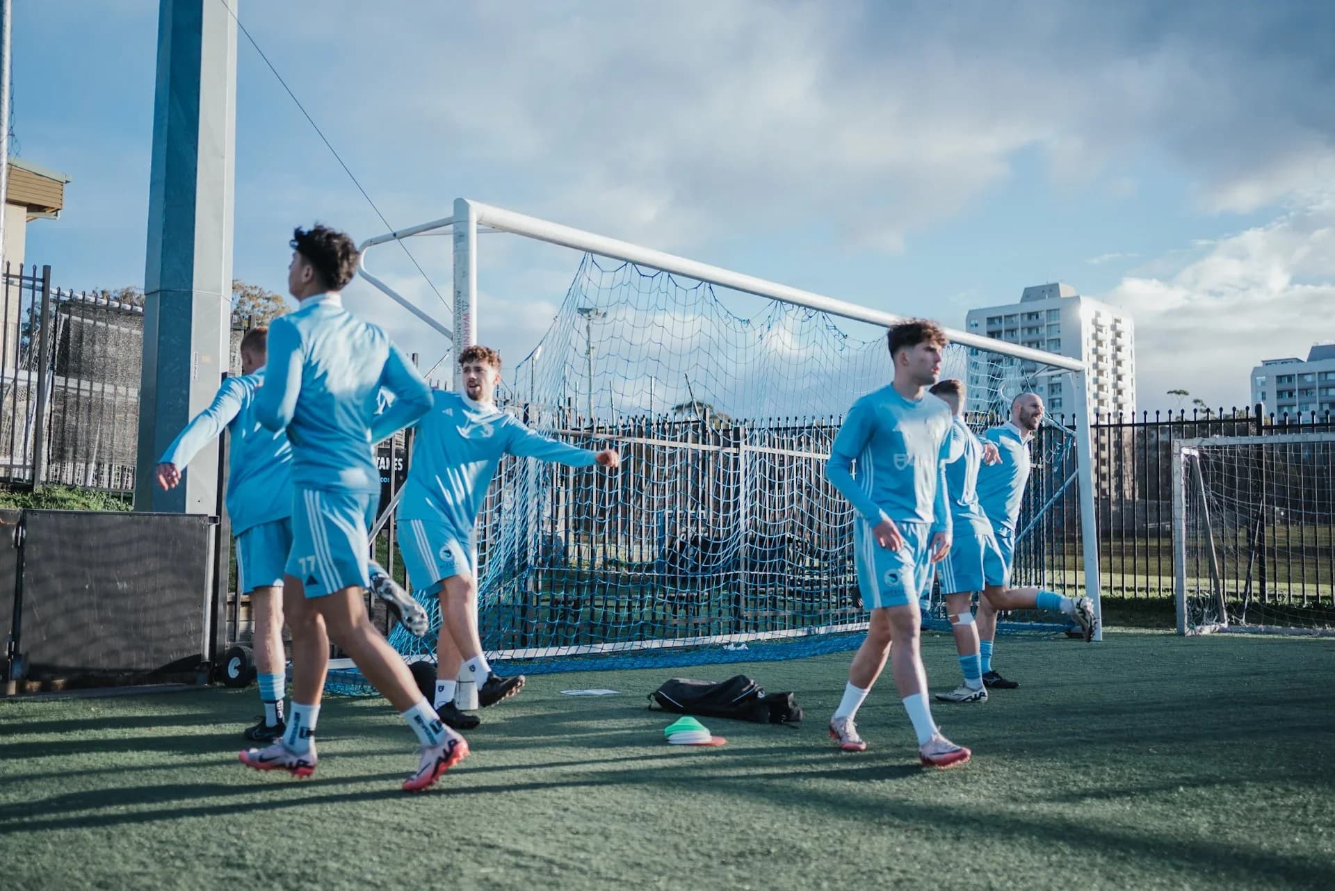 Sharks players warm up beside the goal before the match against Sydney FC