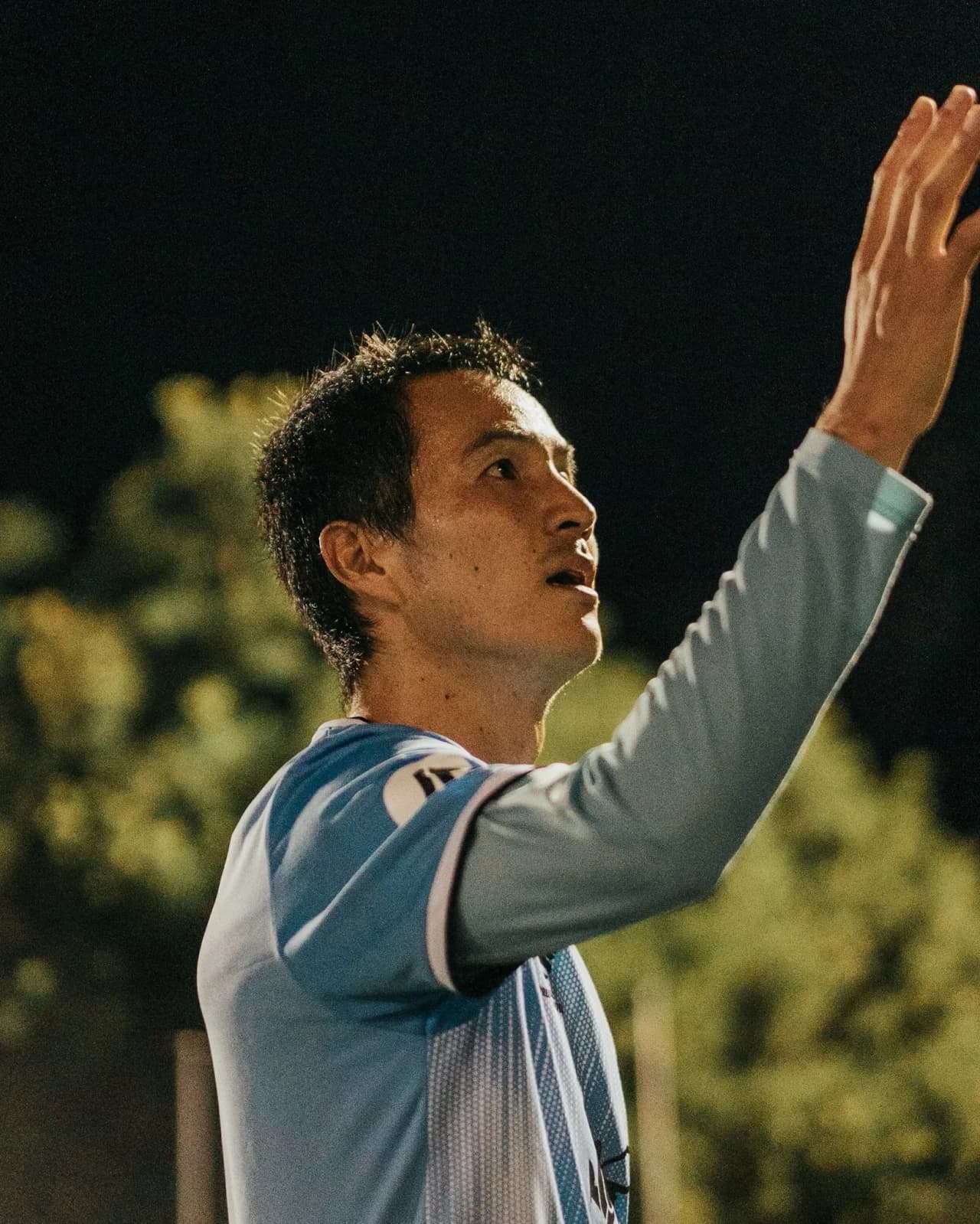 A Sharks player waves to the crowd after the comeback win over Manly