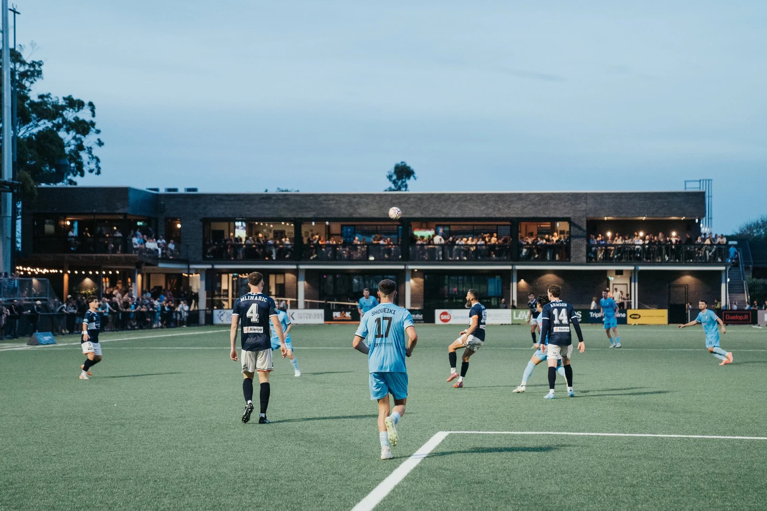 A packed Seymour Shaw at dusk as the Sharks play Marconi
